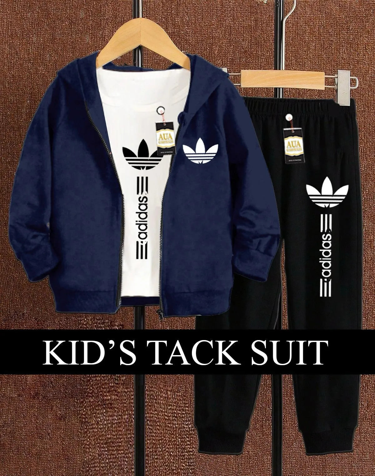 Kids tack suit displayed on a hanger, featuring a navy blue fleece hoodie and black trousers with Adidas logo.